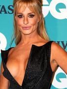Taylor Armstrong Turns Heads Down Under in Daring Dress!