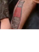 "Twilight" Star Shows Off His Ketchup Bottle Tattoo