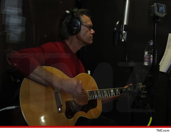 1127_randy_travis_tmz_wm