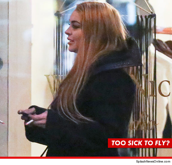 0129_lindsay_lohan_soho_shopping_smoking_v2