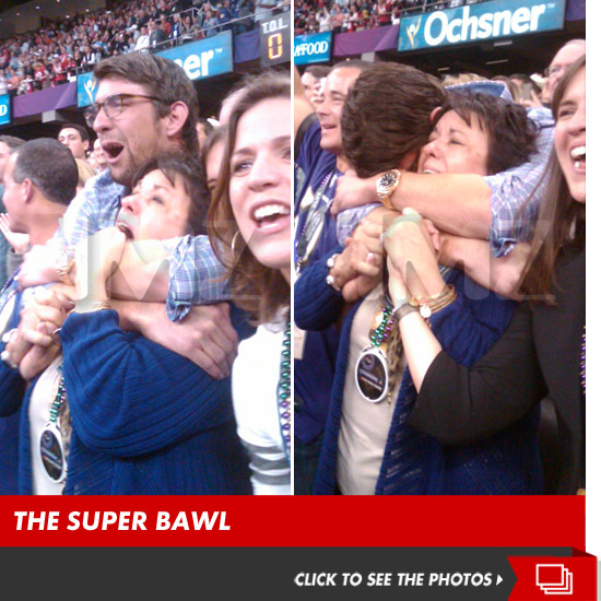 Michael Phelps & Mom CRYFEST at the Super Bowl