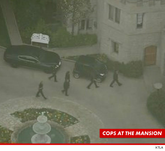 0221-playboy-mansion-cops