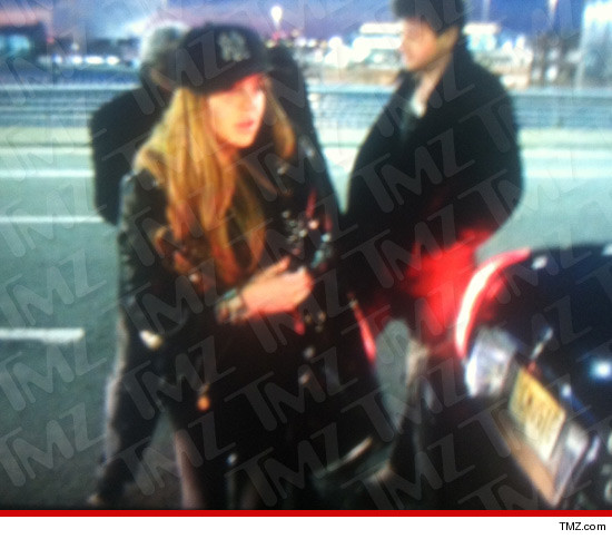 0317_lindsay_lohan_jfk_tmz_2