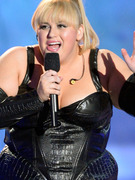 Rebel Wilson Sports Skin-Tight Leather Suit for MTV Movie Awards