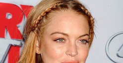 Lindsay Lohan Violates Rehab Deal -- Flying To California