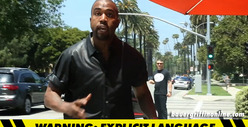 Kanye West -- FLIPS OUT on Photog After Slamming Head on Sign