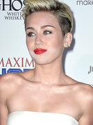 Miley Cyrus Suffers Makeup Malfunction at Maxim Hot 100 Party