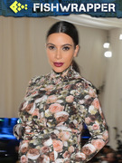 Kim Kardashian Really Wants Us to Believe That Her Lips Are Pregnant, Too