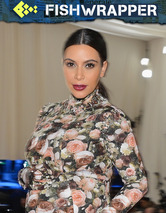 Kim Kardashian Really Wants Us to Believe That Her Lips Are Pregnant, Too
