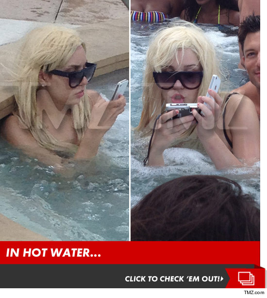0617_amanda_bynes_hot_tub_wig_photos_launch