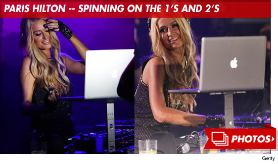 1010_paris_hilton_dj_spinning_footer