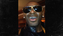 R. Kelly Slums It With Cell Phone Music Video