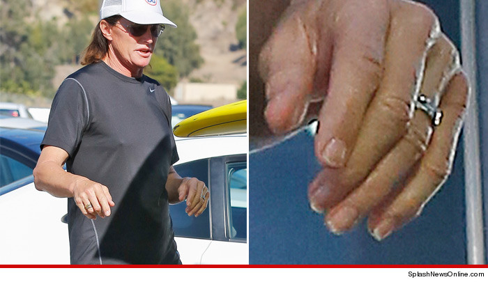 0207-bruce-jenner-splash-hand