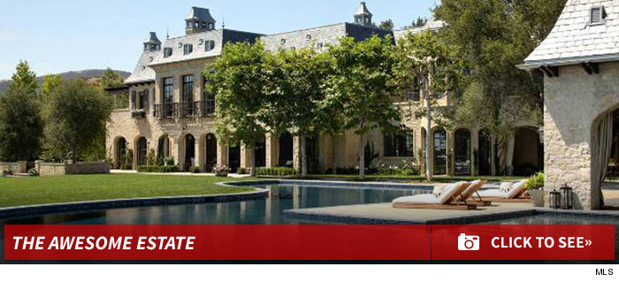 0506_dr_dre_tom_brady_house_footer