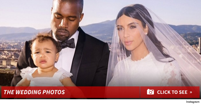 0619_kanye_kim_kardashian_wedding_footer