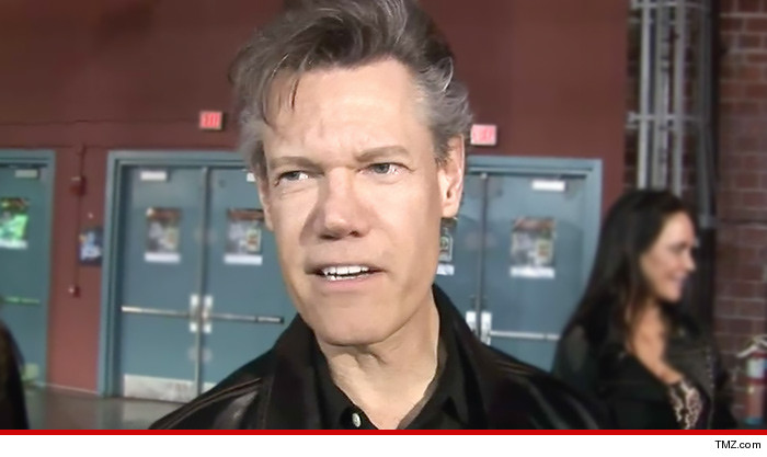 0620-randy-travis-tmz-01