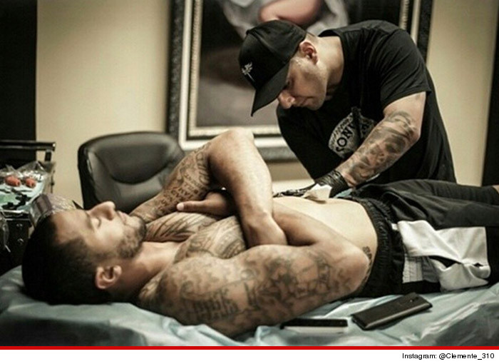 0708-colin-kaepernick-tat-tat-artist-intsa-CREDIT-01