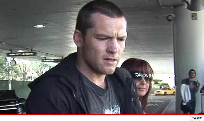 0912-sam-worthington-tmz-01