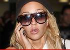 Amanda Bynes Makes it Rain in Hotel Lobby