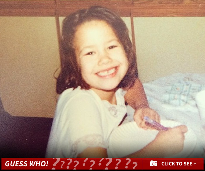 Guess Who This Grinning Girl Turned Into!