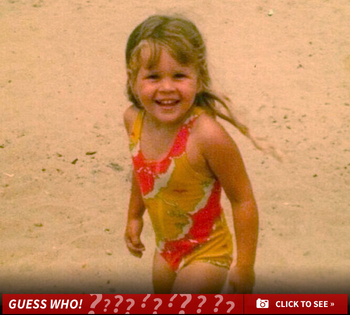 Guess Who This Sandy Little Kid Turned Into!