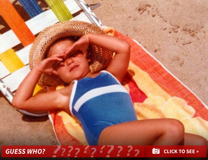 Guess Who This Sunbathing Beauty Turned Into!