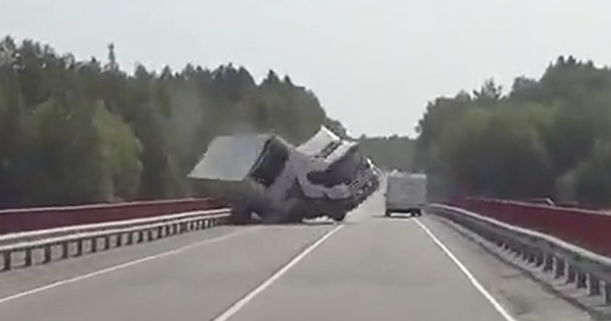 Watch Russian Rig Nearly Flip Off Bridge!!!