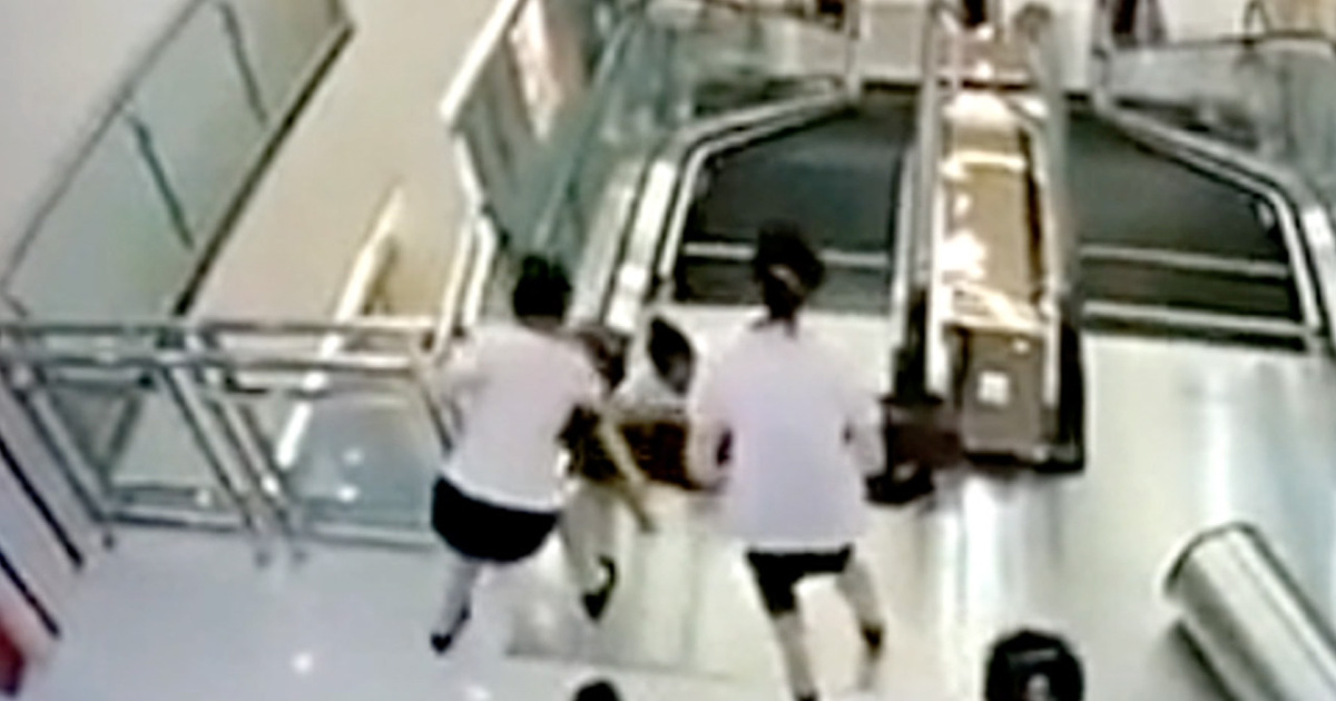 Heroic Woman Saves Her Son’s Life After Freak Escalator Accident (VIDEO