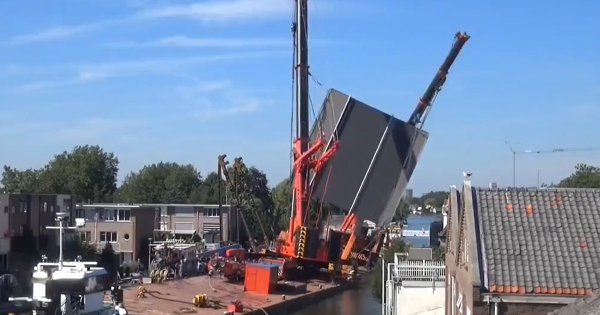 Giant Cranes Fall Off Boat ... Crush Row Of Homes