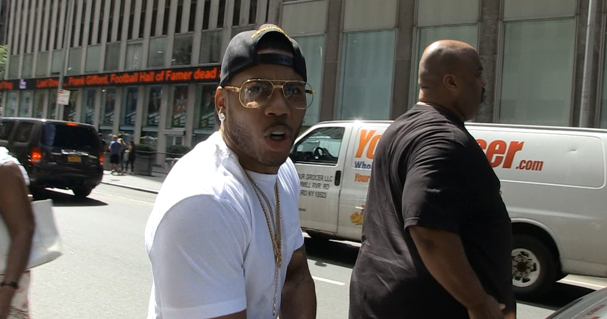 Nelly -- Get to Stompin' in My ... Air Jordan 3s! (VIDEO)