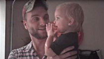 Cutest Reaction -- Baby Loves Playing In The Rain With Dad (VIDEO)