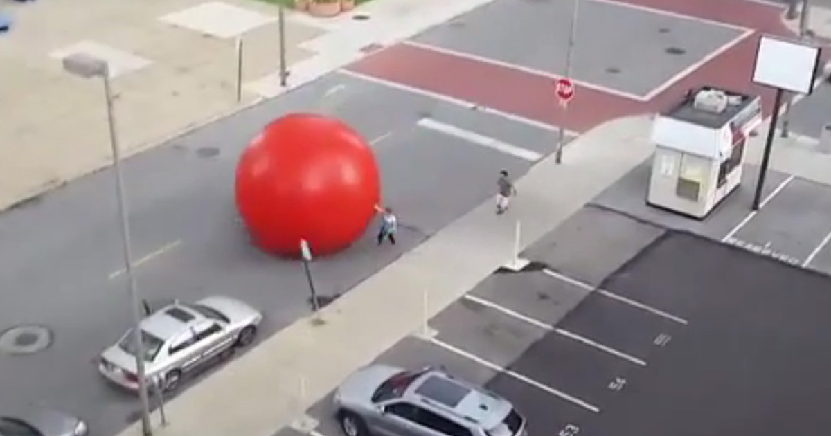 Crazy Video -- HUGE Runaway Ball Through City Streets