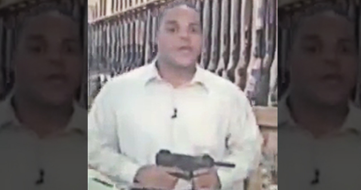 Bryce Williams -- Holding Submachine Gun In News Report