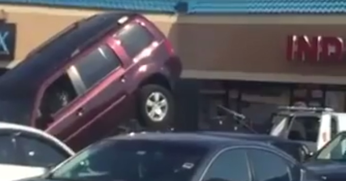 The Struggle Is Real ... Guy Tries To Drive Off Tow Truck
