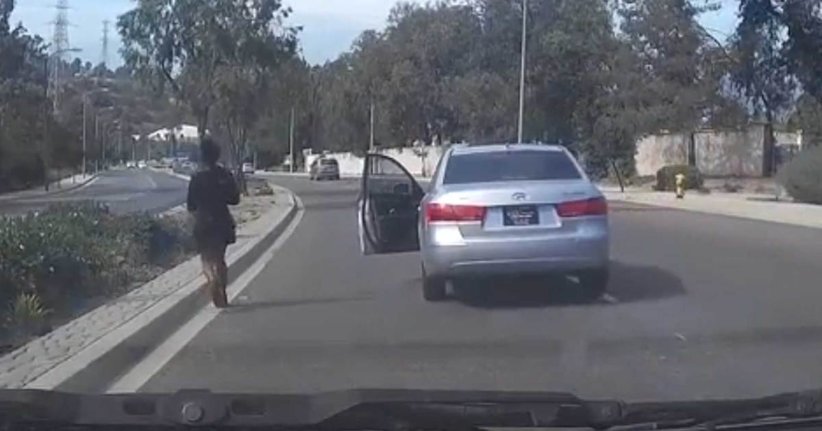 Bizarre Video -- Woman Bails On Car Mid-Ride