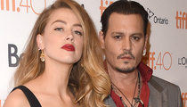Johnny Depp and Amber Heard Show Major PDA at "Black Mass" Premiere 
