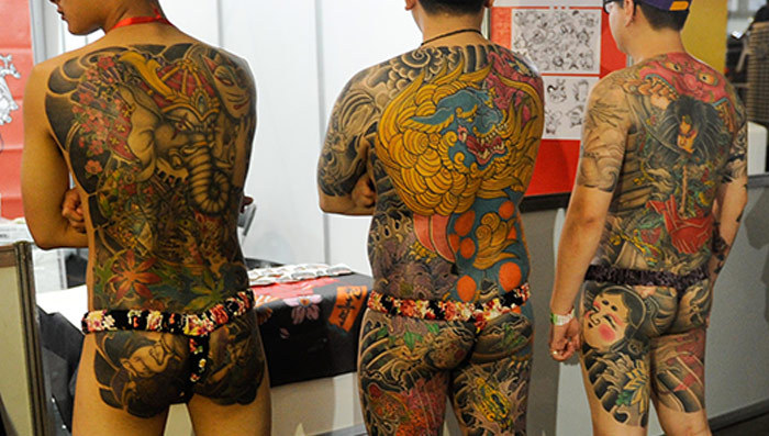 Show Us Your Tats -- Ink Enthusiasts Strip For Exotic Tattoo Expo