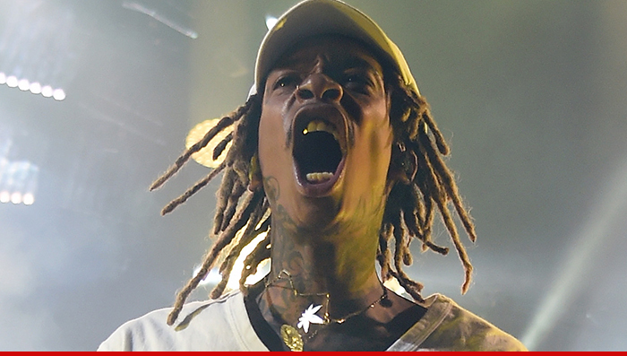 Wiz Khalifa -- Busted with Pants Down ... Taking a Public Whizz
