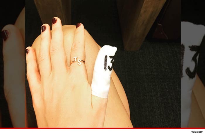 1018-taylor-swift-finger-INSTAGRAM-01