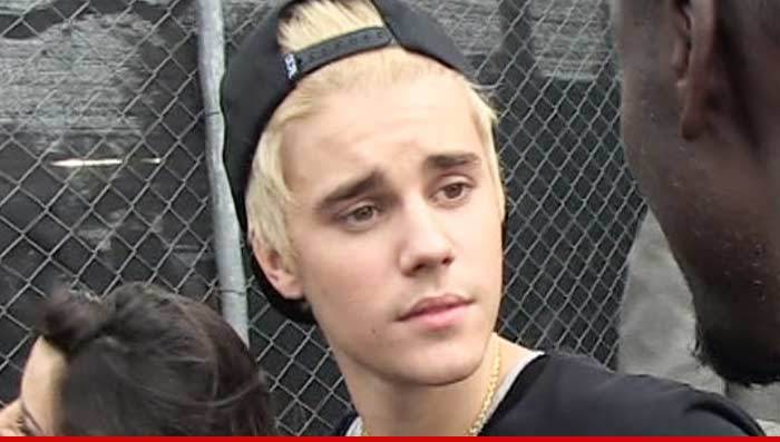 Justin Bieber Off Formal Probation ... He Got His Hands Dirty