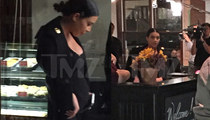 Kim Kardashian -- Black is Belly, Belly Slimming (PHOTOS)