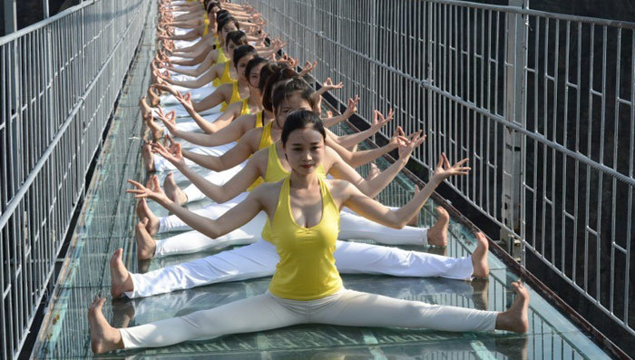 Spandex Clad Yogis Stretch on Sketchy Bridge -- The Suspense!