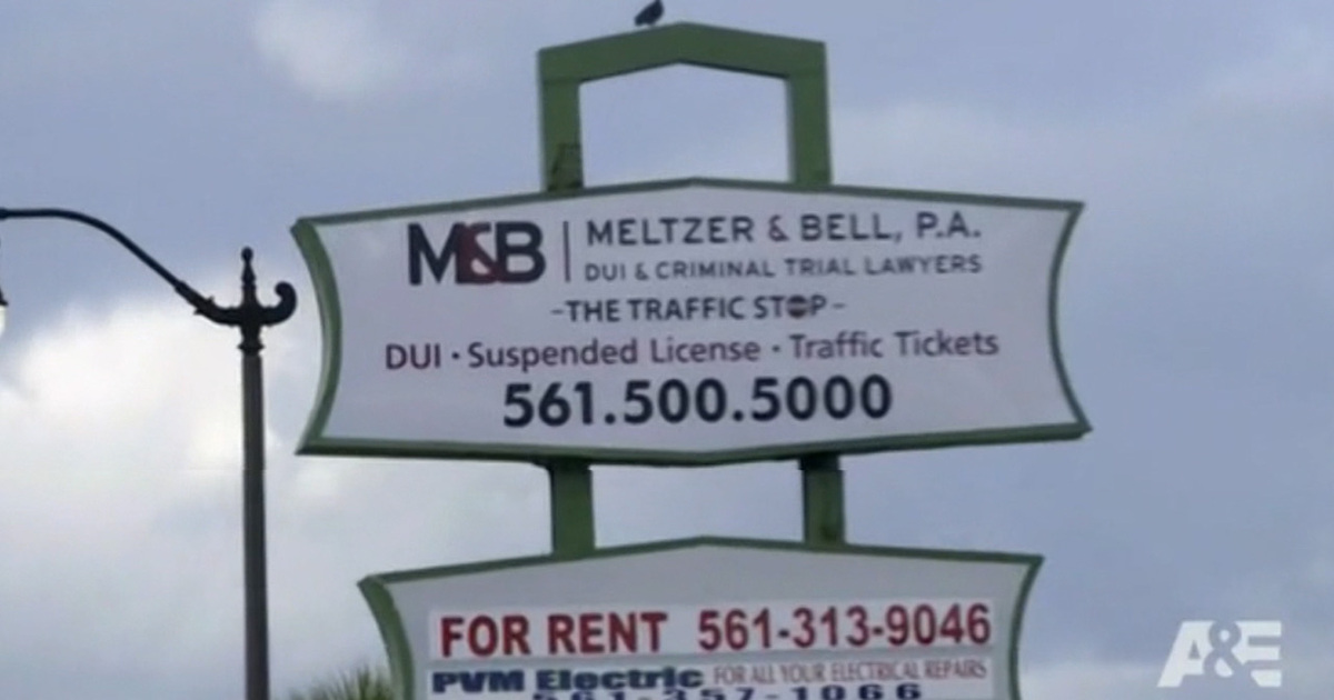 A&E's 'American Takedown' Sued -- Read the Sign ... We're Lawyers, Not Crooks (VIDEO)