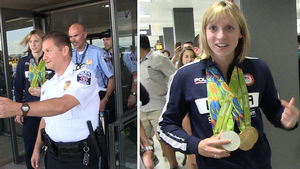 Katie Ledecky -- 8-Man Security Team at Airport ... Gotta Protect That Gold!